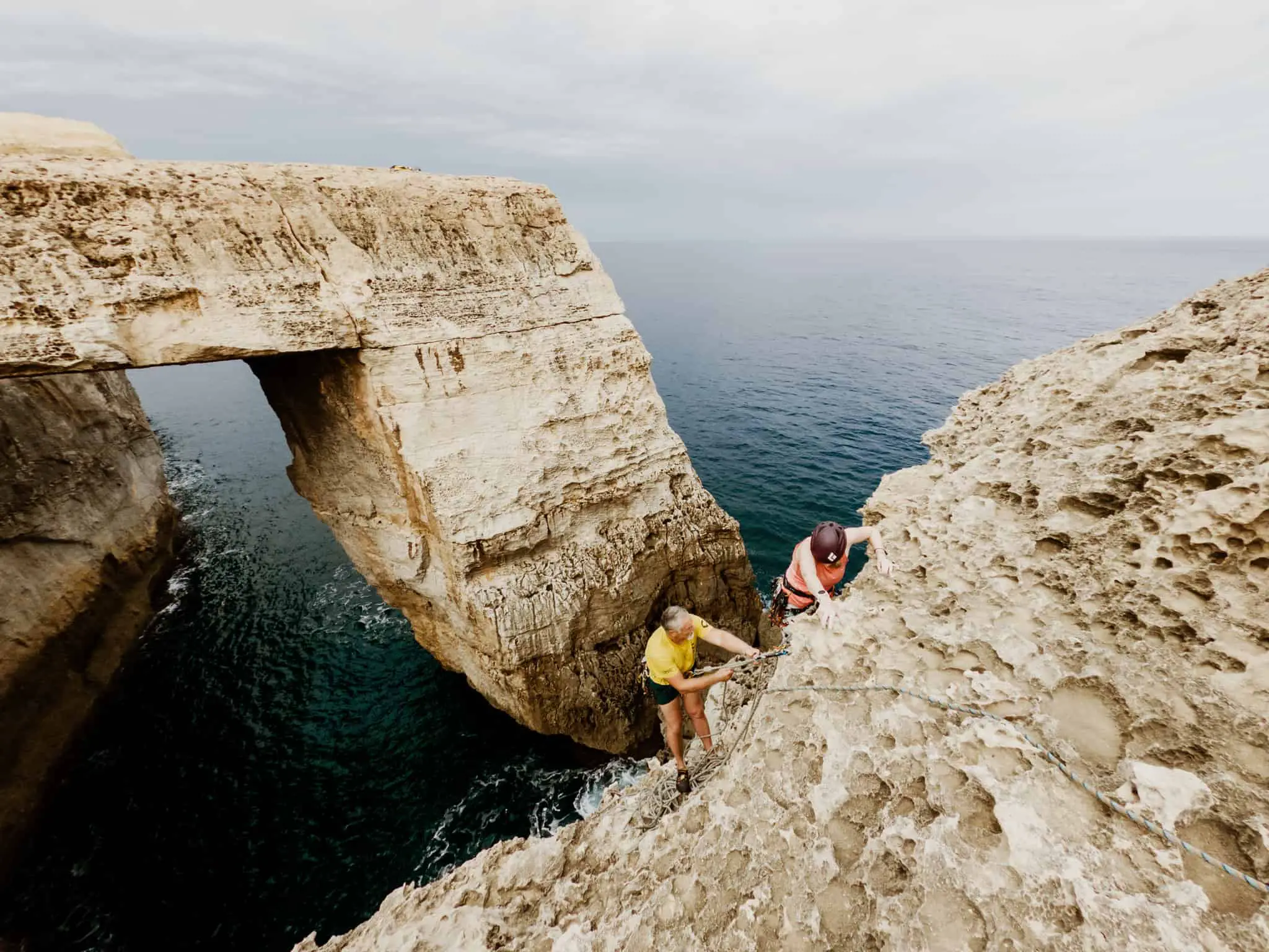 Sea cliff climbing in Malta at Azure window at Wied il-Mielah on Gozo