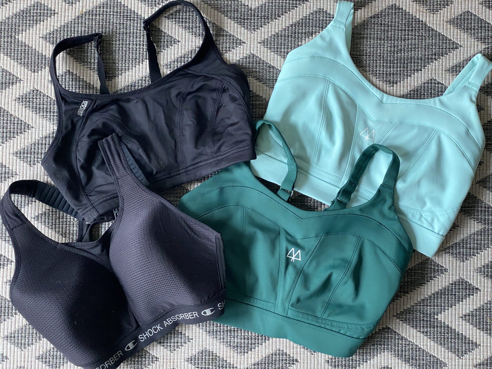 Photo of 4 sports bras on the floor